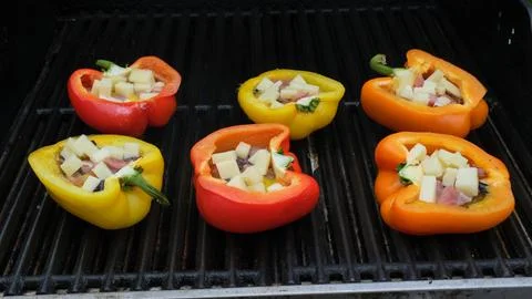 Overhead view of grilling stuffed savory bell Stock Photos