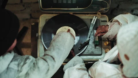 Overhead View of Hands Operating Vintage Record Player Vidéo 347078769