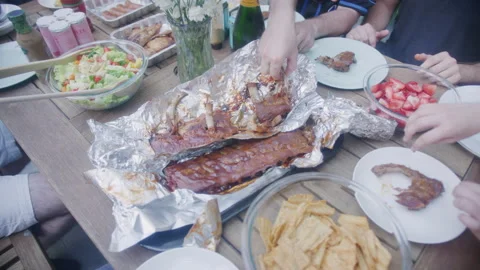 Overhead View Of Hands Tucking Into Cook... | Stock Video | Pond5