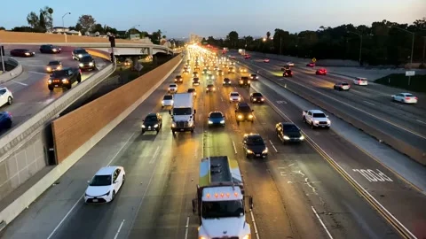 Overhead view of a highway at dusk, rush hour traffic, 4K Video stock 223188832