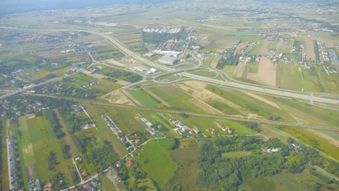 Overhead view of a highway interchange with traffic in 4k slow motion 60fps Stock Footage 284218972