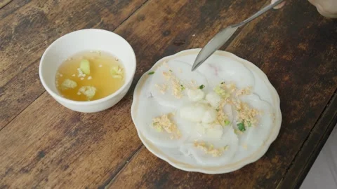 Overhead view of a Hue steamed rice dumpling dish, 4K Stock Footage 341551677