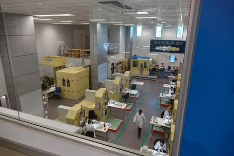 An overhead view inside the Royal Australian Mint production facility, feat.. Stock Photos