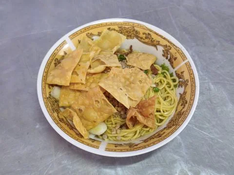 Overhead view of Javanese egg noodles with fried wonton chips Stock Photos