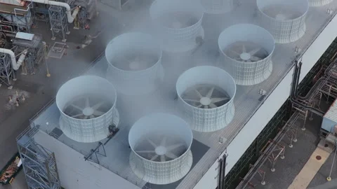 Overhead view of large cooling tower fans at an industrial complex Stock Footage 346379401