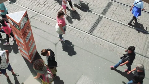 Overhead view of large crowd of people pedestrians customers walking on the Stock Footage 148056371