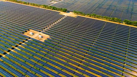 Overhead view of large solar panel installation array. High angle drone pat.. Stock Photos