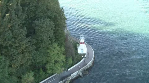 Overhead View Of Lighthouse And Cyclists Stock Footage 16281361