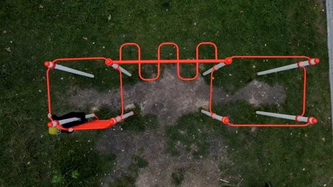 Overhead view of little boy playing at playground outdoors Stock Footage 204854542