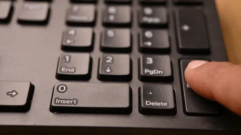 Overhead View of Man Pressing Enter Key on Keyboard for Command Execution Stock Footage 333575864