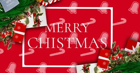 Overhead view of merry christmas text over presents and pine needles on red Illustrazione stock