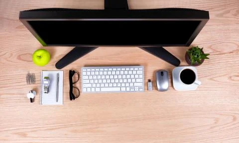Overhead view of office with basic items on desktop Stock Photos