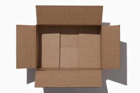 Overhead view of open empty cardboard box Stock Photos