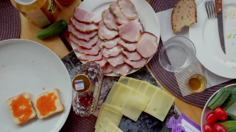 Overhead view of outdoor party table with drinks bread and snacks in Daugavpils Stock Footage 343723665
