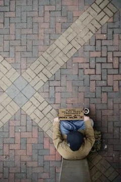 Overhead view of a panhandler in an urban area Stock Photos
