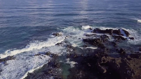 Overhead View Of People Exploring Rugged Ocean Coast Line Stock Footage 85144161