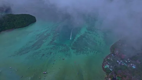 Overhead view of Phi Phi wrapped in morning mist, Thailand Video stock 307437591