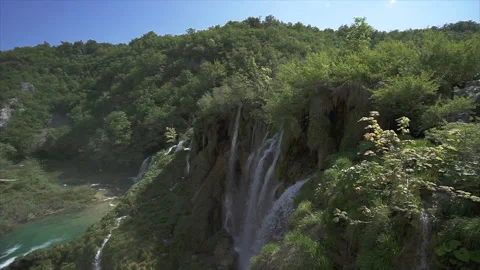 Overhead view of Plitvice lake surrounded by forest Stock Footage 319778508