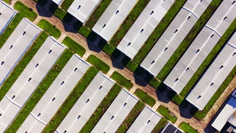 Overhead view of poultry barns in diagonal rows, Bulgaria Video stock 341757423