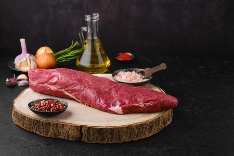 Overhead view of raw beef tri-tip roast with spice and seasoning ready for co Stock Photos