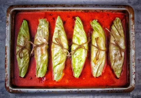 Overhead View Of Raw Cabbage Leaves Rolls Vegetarian Food Stock Photos