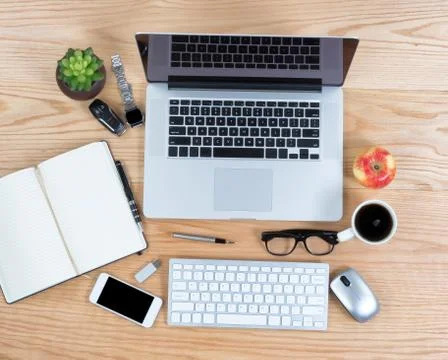 Overhead view of red oak desktop ready for work time Stock Photos