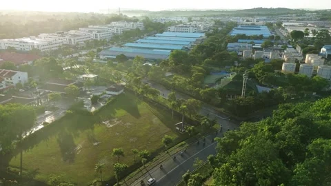 Overhead view revealing a vibrant mixed-use development featuring manufactu.. Video stock 337284447