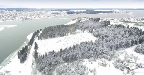Overhead view of the river, the forest and the village in the winter 스톡 동영상 57698659