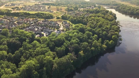 Overhead view of the Riverwalk community along the Catawba River Stock Footage 339971296