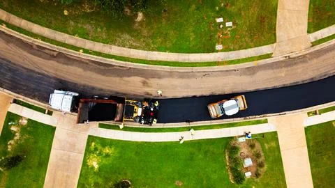 Overhead view of road getting a new asphalt surface Stock Photos