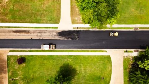 Overhead view of road getting a new asphalt surface Stock Photos