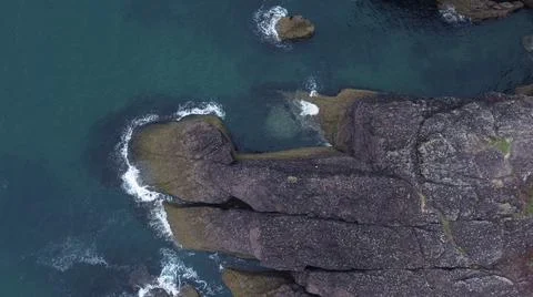 Overhead view of a rock with nice shape. drone video from the coast of Watefo Stock Photos