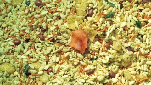 Overhead view of a savory Indian snack known as chiwda Vídeo Stock 319134177