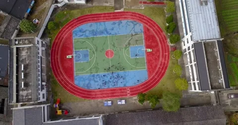 Overhead view of a school track in rural Xiuning county in Anhui, China. Stock Footage 211789620