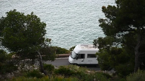 Overhead view of the sea and the road Stock Footage 326450292
