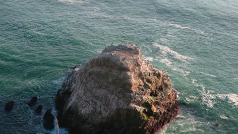 Overhead View of Sea Stack and Crashing Waves on the California Coast Stock Footage 323345208
