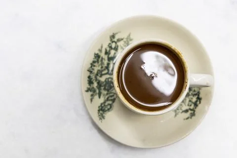 Overhead view on serving of classic retro cup of coffee at kopitiam or old Stock Photos
