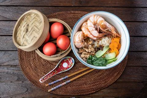 Overhead view on serving of longevity birthday noodles with red eggs, a Stock Photos