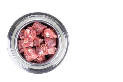 Overhead view on serving of raw barf beef meat chunk for dog meal Stock Photos