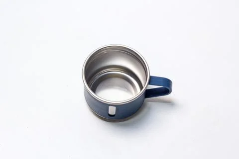 An overhead view showing the interior stainless steel lining of a navy blue.. Stock Photos