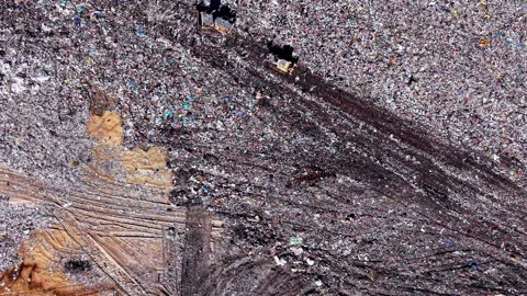 Overhead view of shredded waste texture, landfill Bulgaria Stock Footage 339012818