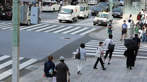 Overhead view of sidewalks and crosswalks in Ginza during coronavirus outbreak. Stock Footage 132403144