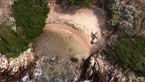 Overhead view of a small bay with a beach at Cap d'Antibes Stock Footage 321755870