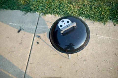Overhead view of a small spherical portable BBQ Stock Photos