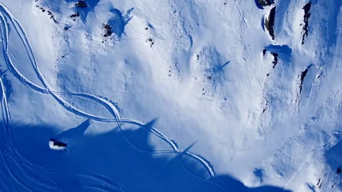 Overhead View of Snow Covered Mountain Field in the Swiss Alps Stock Footage 140790594