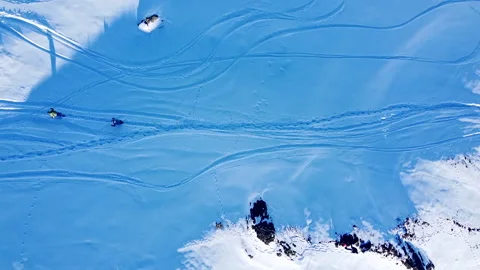 Overhead View of Snow Covered Mountain Field in the Swiss Alps Stock Footage 140790693