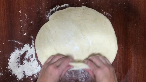 Overhead view of some hands making the dough for a delicious bread Stock Footage 127914284
