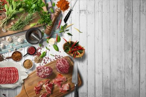 Overhead view steak on a rustic wooden counter in a dinner steakhouse Stock Illustration