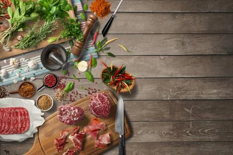 Overhead view steak on a rustic wooden counter in a dinner steakhouse Stock Illustration