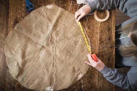 Overhead View of Student Working at Table on School Science Project Stock Photos